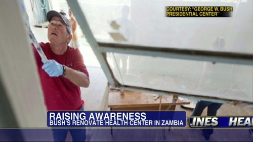 Bush pintando o interior do centro de saúde que estão a renovar